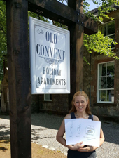 Felicity and Trip Advisor Certificates of Excellence for Old Convent Holiday Apartments near Loch Ness Scotland
